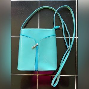 BRAND NEW!! From Italy!! Real leather. Cross body bag. Beautiful teal/turquoise